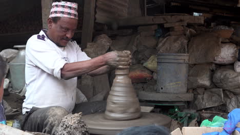 Kathmandu,-Nepal---November-16,-2019:-A-man-making-a-clay-pot-on-a-potter's-wheel