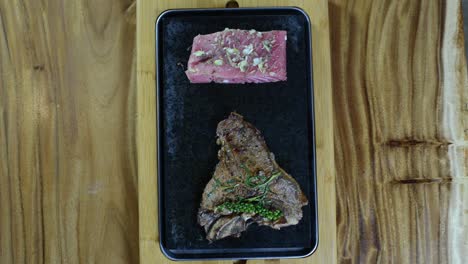 A-Slice-Of-Grilled-Steak-And-Fresh-Salmon-With-Herbs-And-Spices-With-Two-Dips-On-The-Side---Top-View-Shot