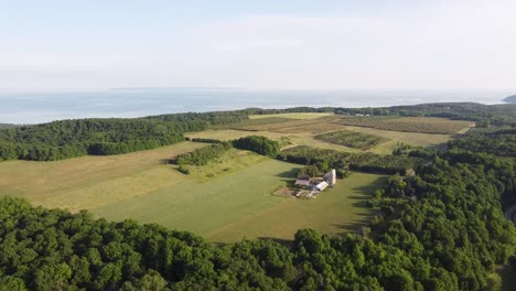 Lush-Farmland-In-Leelanau-County-By-The-Sleeping-Bear-Dunes-National-Lakeshore-In-Pure-Michigan-On-A-Fine-Weather---aerial