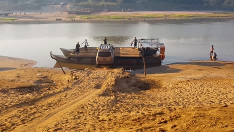 Car-boarding-small-local-ferry-to-cross-river-in-Madagascar