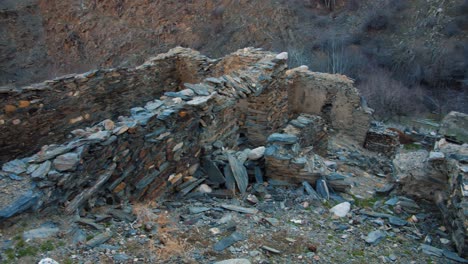Old-stone-fortress-in-the-mountains-Silk-Road,-Sentob-village-Uzbekistan-14-of-22