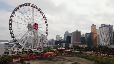 Hong-Kong-Observation-Wheel-and-AIA-Vitality-Park-with-city-skyscrapers-in-the-background