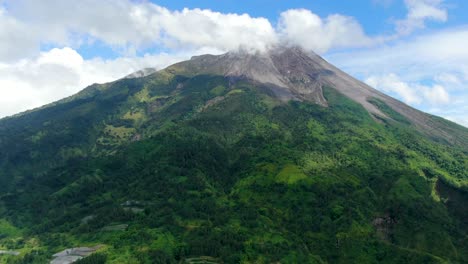 Tropical-landscape-of-active-volcano-Mount-Merapi,-Java,-Indonesia,-aerial-view