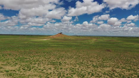 Drone-footage-of-small-hill-on-vast-Outback-Queensland-Plain