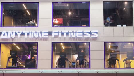 Customers-exercise-at-a-gym-as-they-run-on-treadmills-and-boxing-after-the-government-eased-social-distancing-restrictions-in-Hong-Kong