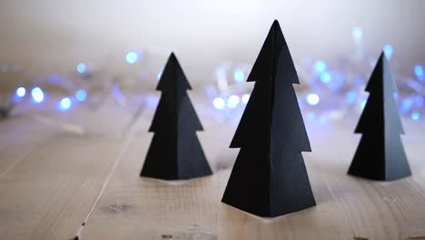 Handmade-Christmas-tree-decorations-with-bokeh-light-background-medium-panning-shot