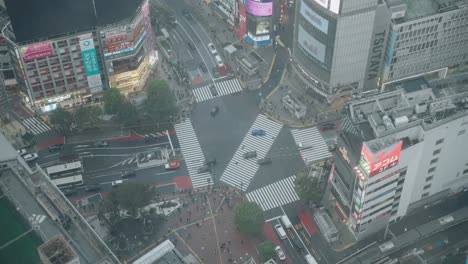 Wide-High-Angle-Shot-of-the-Traffics-at-the-Shibuya-Crossing-During-the-Covid-19-Pandemic,-Slow-Mo
