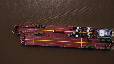 Aerial-View-Looking-Down-At-Dynamica-Barge-Going-Past-On-Oude-Maas