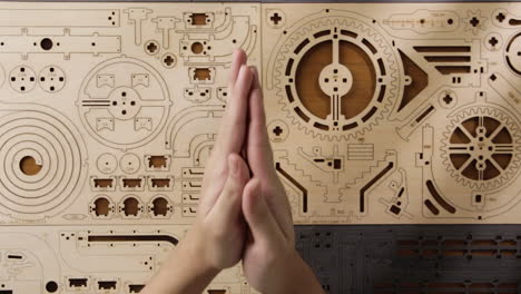 Rubbing-Hands-And-Getting-Ready-To-Assemble-A-DIY-Game-Puzzle