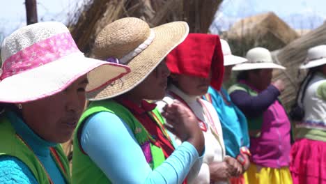 Happy-Locals-Native-Women-Warmly-Welcome-Tourists-In-Isla-Del-Sol-In-La-Paz,-Bolivia---Tourist-Destination---Closeup-Shot