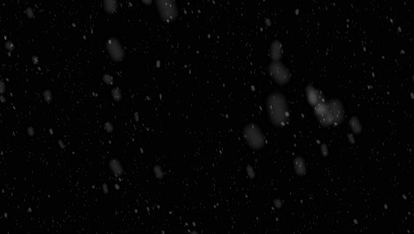 Falling-snow-against-black-background-for-overlay.-Alpha