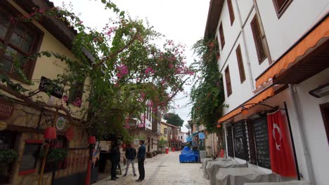 Walking-through-a-street-of-empty-restaurants-in-Antalya,-Turkey
