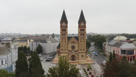 Drone-footage-from-a-chruch-at-Nyiregyhaza,-Hungary-Drone-moves-fast-left