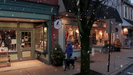 Window-shopping-at-Christmas-during-winter-snow