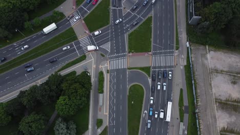 A-drone-video-of-cars-at-a-traffic-intersectiosn-in-Warsaw,-Poland