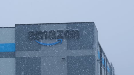 Amazon-warehouse-with-heavy-snow-falling
