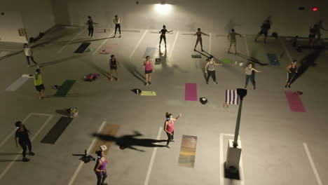 Students-enjoy-outdoor-roof-top-Zumba-class-on-warm-night-in-Miami