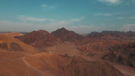 Drone-shot-of-desert-mountains-and-dunes-of-Southern-Israel
