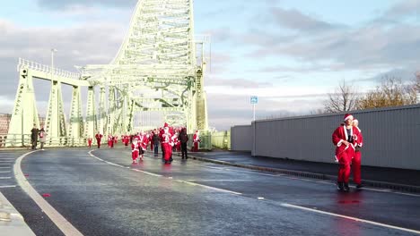 Slow-motion-Charity-Santa-dash-fun-run-across-Runcorn-Silver-Jubilee-bridge