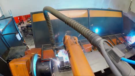 Robotic-Welder-Arm-In-A-Safety-Driven-Manufacturing-Factory-Machine-Shop-that-builds-steel-products-for-hitches-Stock-Video-Footage-#2