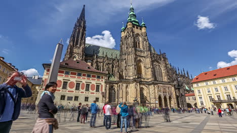 Time-lapse-shot-of-many-tourist-walking-on-central-square-in-front-of-castle-of-Prague,Czech