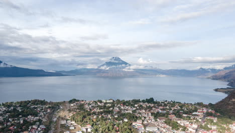 Slow-aerial-hyperlapse-in-the-morning-above-the-town-on-Pana-with-Lake-Atitlan-and-mountain-in-teh-background