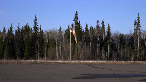 Broken-Windsock-On-Pole-At-Fort-Saint-James-Airport-In-British-Columbia,-Canada