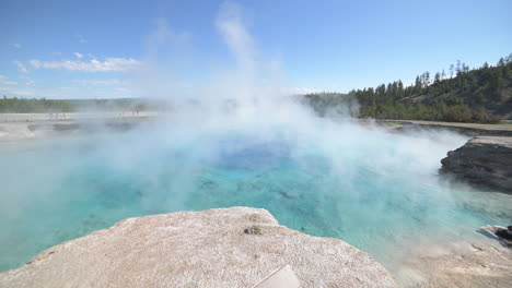 Steam-Above-Mineral-Thermal-Hot-Spring-Pool-in-Yellowstone-National-Park-Wyoming-USA,-Static-View,-Close-Up