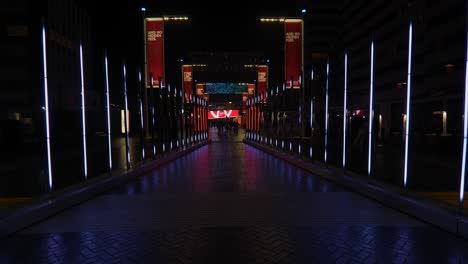 Colourful-abstract-illuminated-corridor-artwork-installation-at-Wembley-park-Winterfest-during-nightfall
