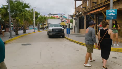 Tour-guide-explains-the-history-of-Boqueron,-Puerto-Rico-in-downtown-neighbourhood