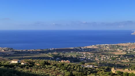 Panoramic-panning-view-of-Mount-Cofano-and-coastline-from-Erice-viewpoint-in-province-of-Trapani,-Sicily