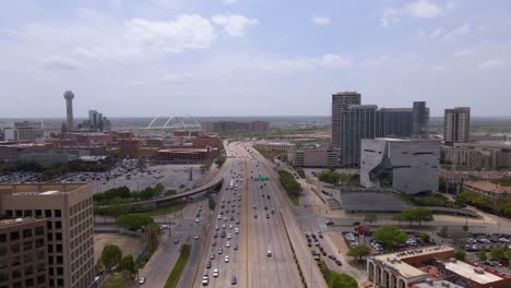 Aerial-view-overlooking-cars-on-the-Texas-State-Highway-Spur-366,-in-Uptown,-Dallas,-USA