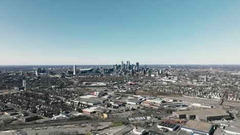wide-aerial-drone-shot-of-the-downtown-Minneapolis-skyline-in-Minnesota
