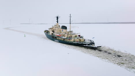 Icebreaker-Vessel-Sailing-Through-The-Thick-Sea-Ice-In-Gulf-Of-Bothnia