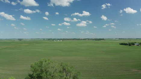 A-dynamic-ascending-aerial-footage-of-an-agricultural-land-in-Swea-City,-Iowa,-Wisconsin