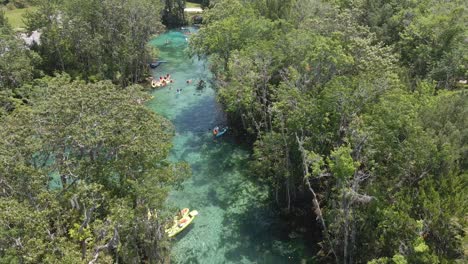 Beautiful-turquoise-water-in-Three-Sisters-spring,-Florida-near-Crystal-river,-aerial-view