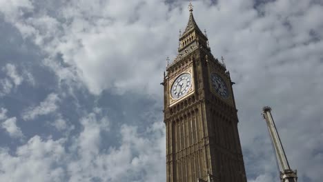 Looking-Up-At-Newly-Restored-At-Iconic-Big-Ben-Clock-Tower-With-Mobile-Crane-Boom-Standing-Beside-It