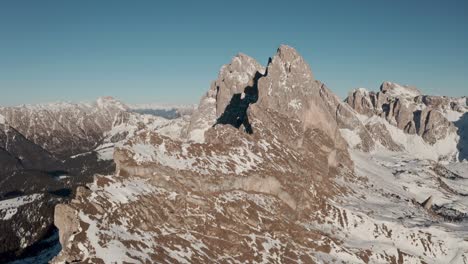 Slow-dolly-back-drone-shot-over-impressive-mountain-ridge