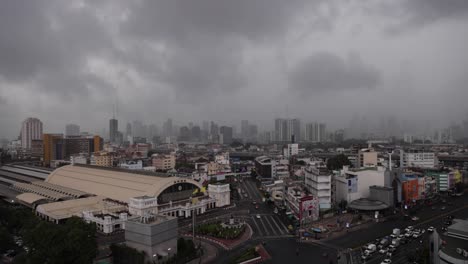 Dramatic-stormy-clouds-with-Lightning-over-the-Bangkok-skyscrapers-and-Hua-Lamphong-Railway-Station