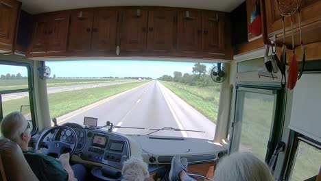 POV-of-man-driving-his-Tiffiin-Class-A-coach-from-the-interstate-in-southern-Missouri