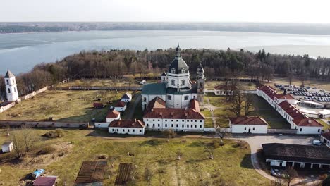 Pazaislis-Monastery-complex-in-aerial-orbiting-view-of-sunny-day