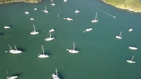 Sailboats-anchored-in-bay-from-the-air-Caribbean-island-drone