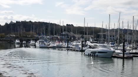 Fishing-boat-leaving-sunny-luxury-Conwy-marina-North-wales-waterfront