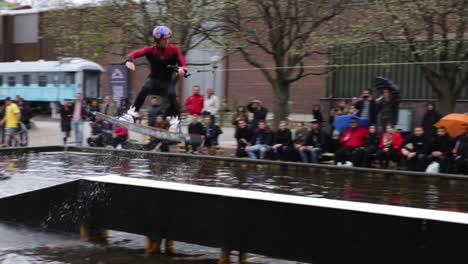 Super-Slowmotion-of-a-Redbull-sponsored-Wakeboarder-jumping-on-to-a-wide-box