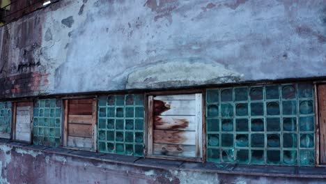 Aerial---abandoned-factory-building,-Vlahita,-Romania,-rising-medium-shot