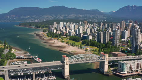 Aerial-View-Of-Burrard-Bridge,-Beach,-Marina,-False-Creek-And-Downtown-Vancouver-On-A-Sunny-Day-In-Canada
