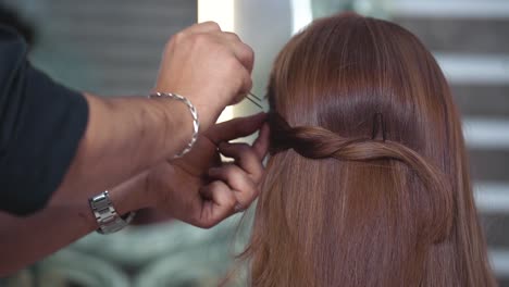 Hairdresser-Creating-A-Hairstyle-For-Bride-In-Salon-Using-Spray-Lacquer-Fixing---slow-motion-120-fps
