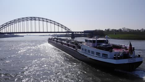 Tanker-Ship-Navigating-In-Noord-River-Towards-Bridge-Over-The-Noord-In-Netherlands