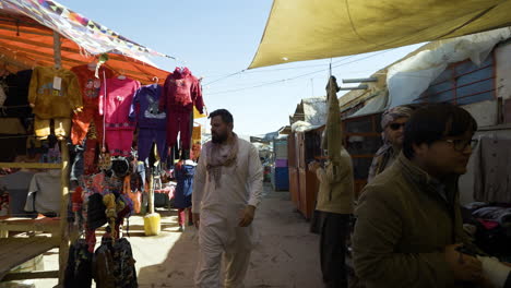 Traveler-Guy-Walking-Through-Local-Public-Market-In-Bamyan,-Afghanistan