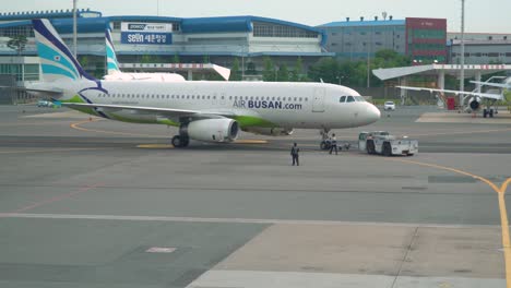 Scenery-Of-Airplane-Parking-At-The-Tarmac-In-Busan-Airport-In-South-Korea